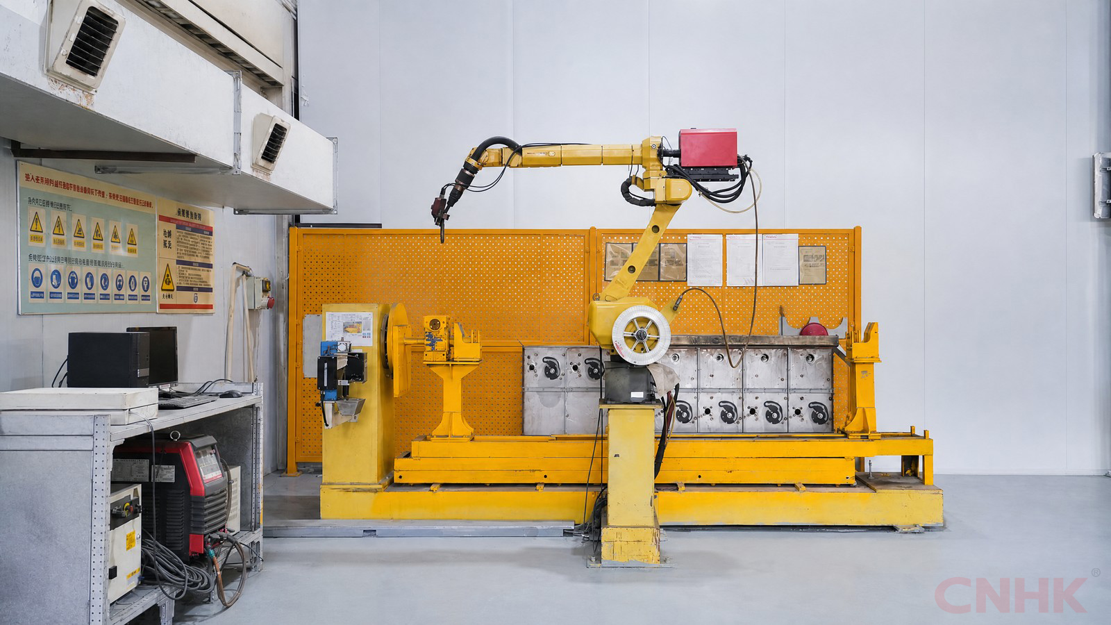 Robotic welding station for cabinet components